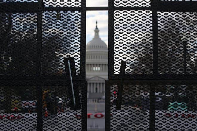 A metal fence surrounds the U.S. Capitol complex on March 6, 2021, two months to the day after rioters stormed the building. Credit: Philip Yabut/Shutterstock.