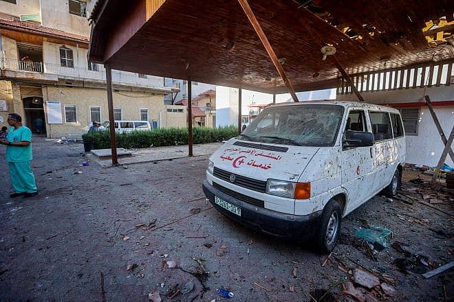 Palestinian medical personnel observe some of the damage caused from an explosion, at Al-Ahli Arab Hospital in Gaza City, Oct. 18, 2023. Photo by Atia Mohammed/Flash90.