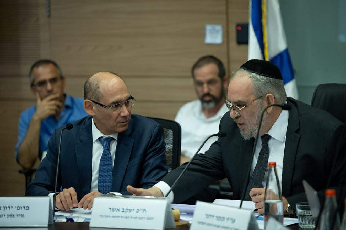 Governor of the Bank of Israel Amir Yaron (left) attends a committee meeting at the Knesset in Jerusalem, July 19, 2023. Photo by Yonatan Sindel/Flash90.