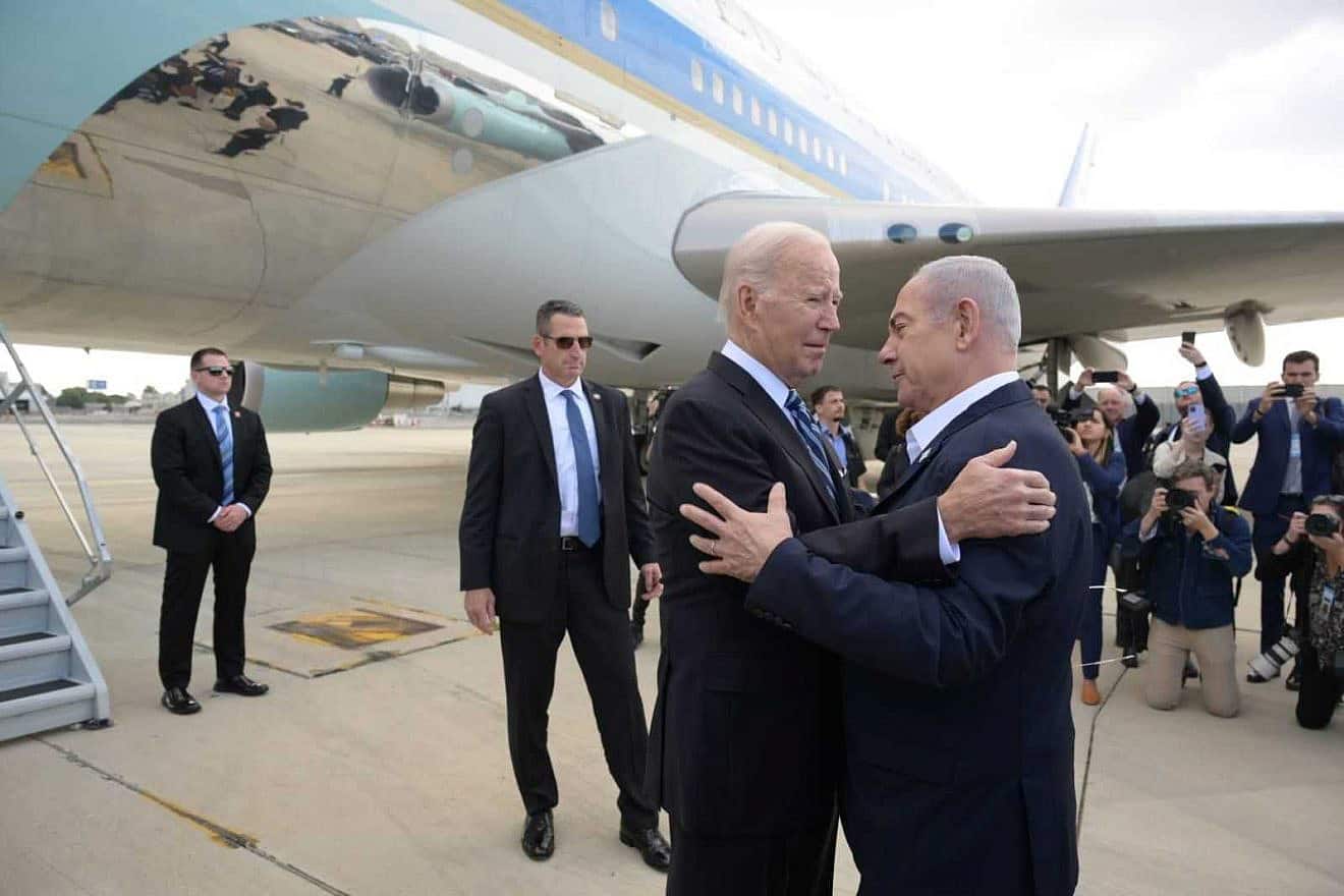 Israeli Prime Minister Benjamin Netanyahu welcomes U.S. President Joe Biden at Ben-Gurion International Airport on Oct. 18, 2023. Photo by Avi Ohayon/GPO.