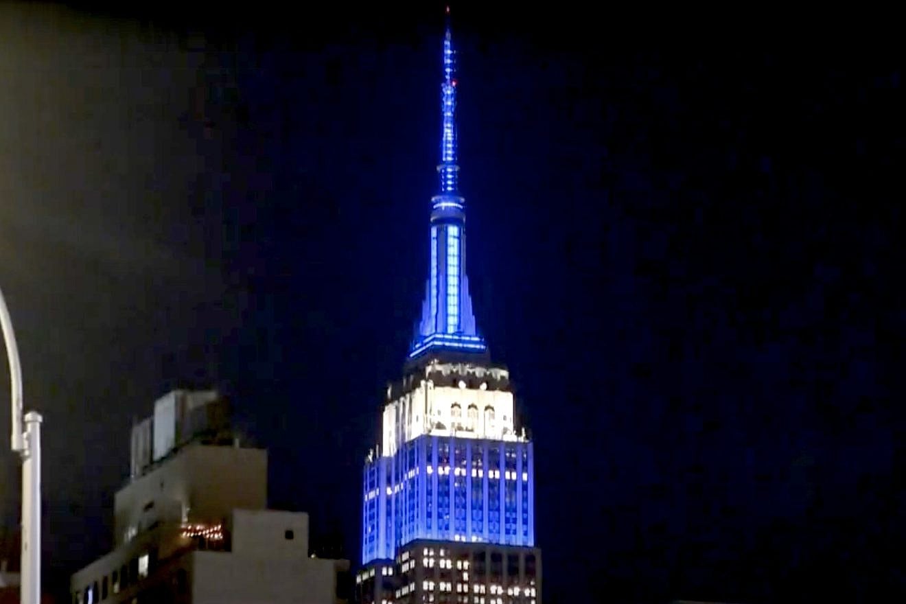 The Empire State Building in New York City lit in blue and white in solidarity with Israel on Oct. 7, 2023. Credit: YouTube/CBS New York.