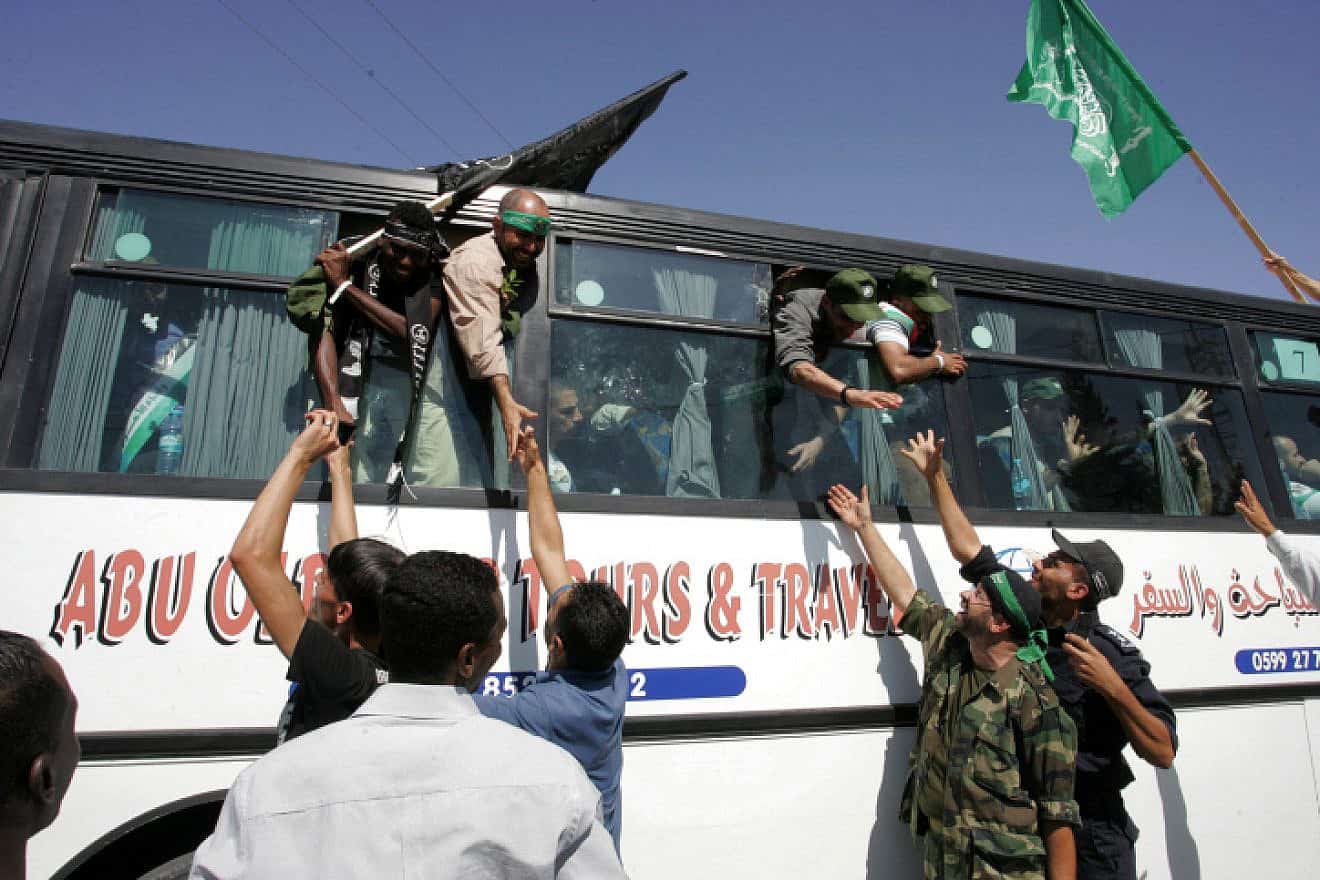 Palestinians who were freed from Israeli jails, as part of a prisoner-exchange deal to have for Israel Defense Forces kidnapped soldier Gilad Shalit returned home, arrive at the Rafah crossing border in the Gaza Strip, Oct. 18, 2011. Photo by Abed Rahim Khatib / Flash 90.
