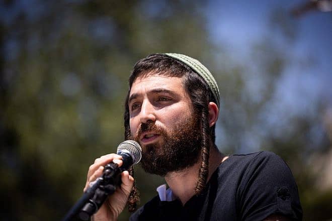 Activist Zvi Sukkot speaks during a protest outside the Prime Minister's Office in Jerusalem, May 8, 2022. Photo by Yonatan Sindel/Flash90.