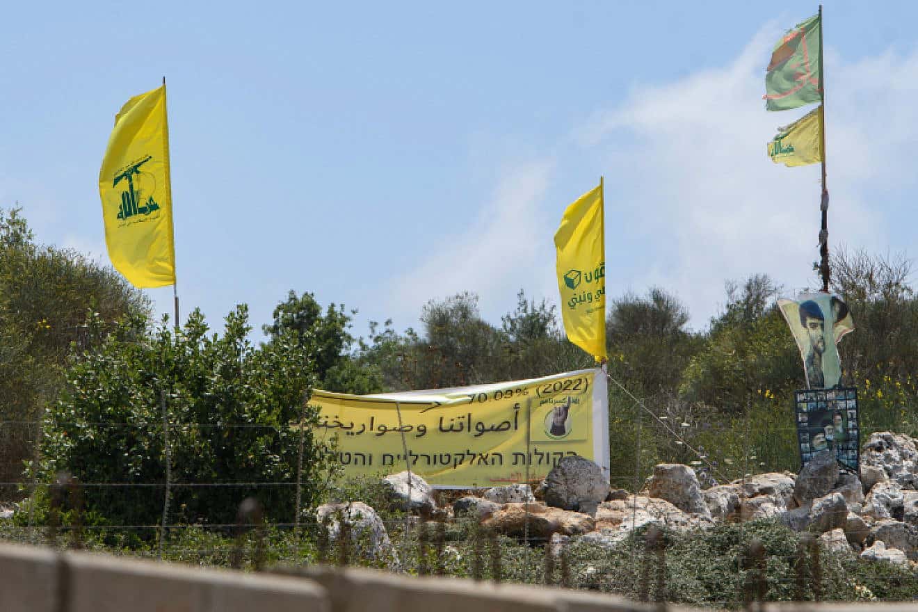 Hezbollah flags on Lebanon's border with Israel, July 3, 2022. Photo by Ayal Margolin/Flash90.