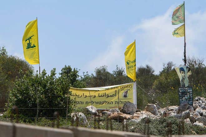 Hezbollah flags on Lebanon's border with Israel, July 3, 2022. Photo by Ayal Margolin/Flash90.