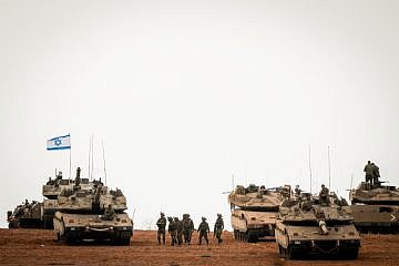Israeli soldiers at a staging area near the Israel-Gaza border, Oct. 9, 2023. Photo by Chaim Goldberg/Flash90.
