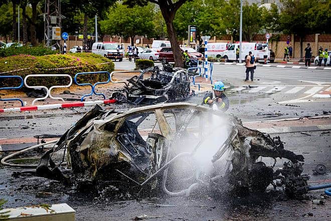 The scene where a rocket fired from Hamas in the Gaza Strip hit buildings and cars in the southern Israeli city of Ashdod on Oct. 9, 2023. Photo by Liron Moldovan/Flash90.