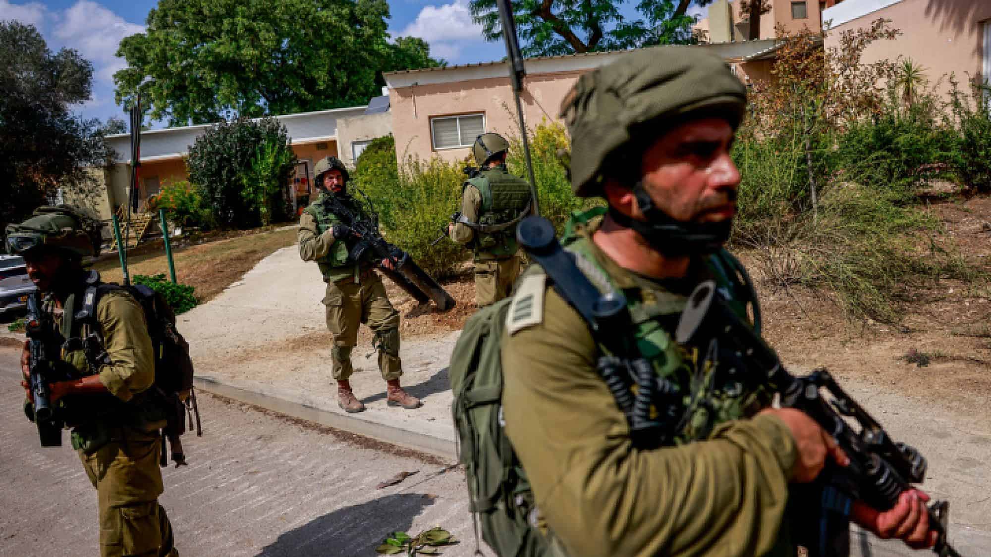 Israeli soldiers in Kibbutz Kfar Aza, near the Israeli-Gaza border in southern Israel, Oct. 10, 2023. Photo by Chaim Goldberg/Flash90.