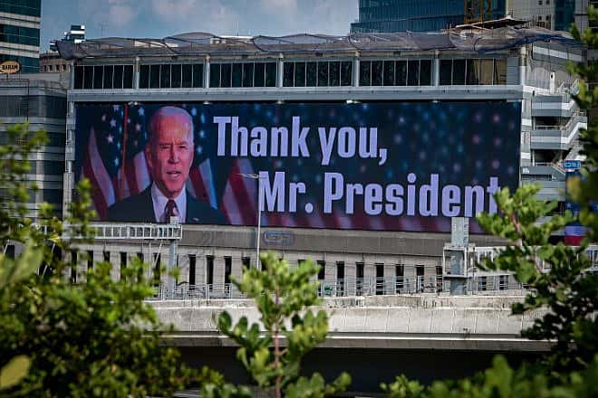 A large billboard thanking U.S. President Joe Biden for his support of Israel is displayed above the Ayalon Highway in Ramat Gan, Oct. 11, 2023. Photo by Avshalom Sassoni/Flash90.