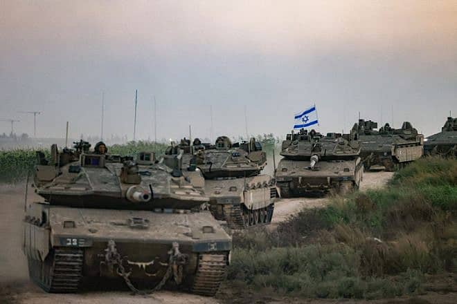 A column of Israeli tanks near the border with Gaza, Oct. 12, 2023. Photo by Chaim Goldberg/Flash90.