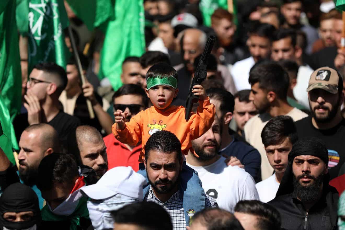 Palestinians march during a pro-Hamas protest in Hebron on Oct. 13, 2023. Photo by Wisam Hashlamoun/Flash90.