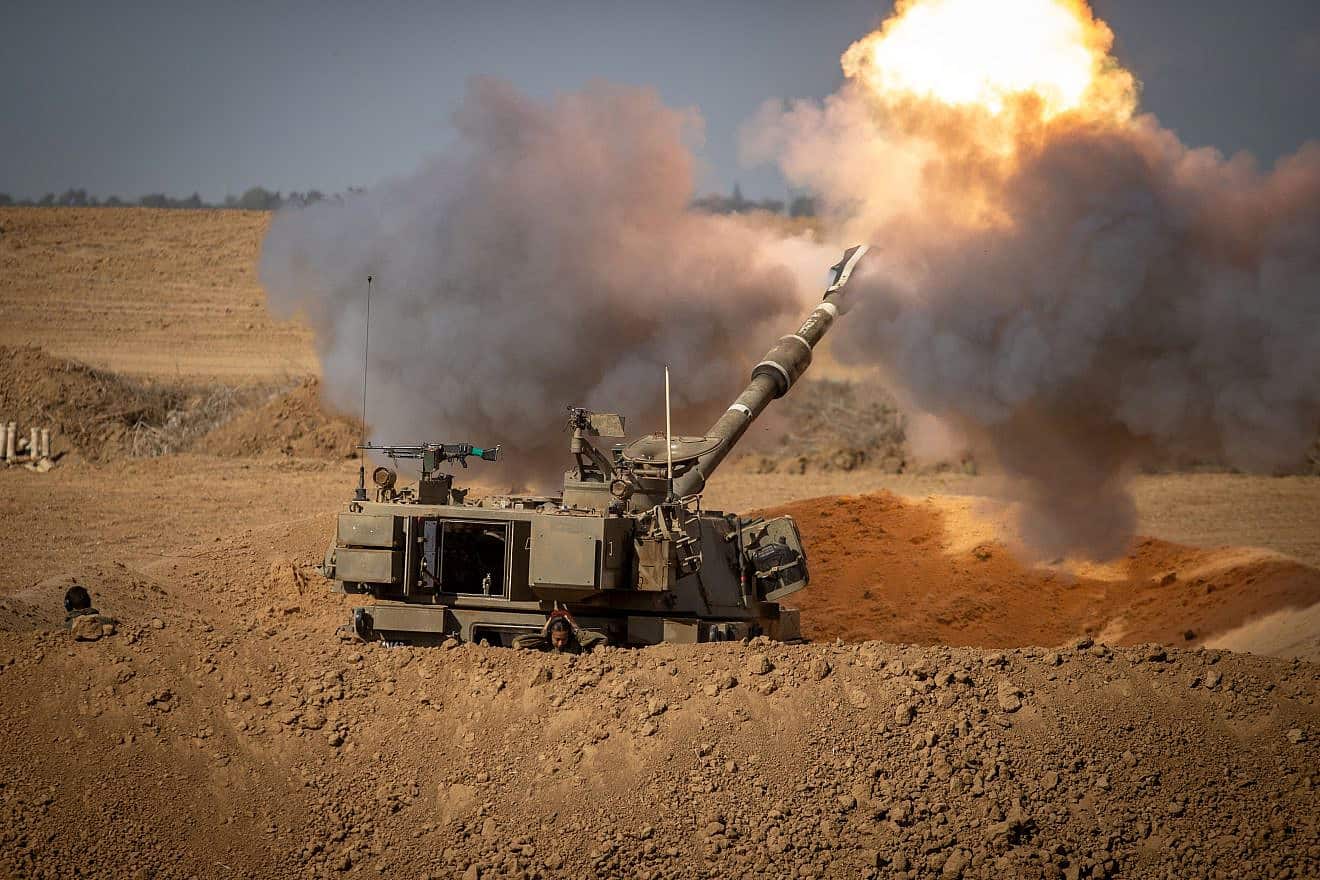 An IDF artillery unit fires into the Gaza Strip, Oct. 15, 2023. Photo by Oren Ben Hakoon/Flash90.