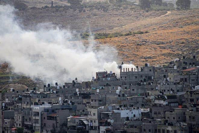 Smoke rises during an IDF raid in Tulkarm, northwestern Samaria, Oct. 19, 2023. Photo by Nasser Ishtayeh/Flash90.
