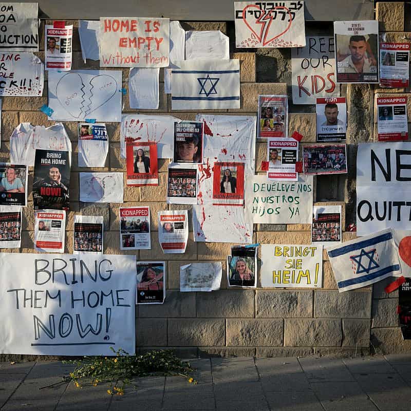 Posters calling for the release of Israelis held hostage by Hamas terrorists in the Gaza Strip, as seen outside the Ministry of Defense in Tel Aviv, Oct. 21, 2023. Photo by Miriam Alster/Flash90.