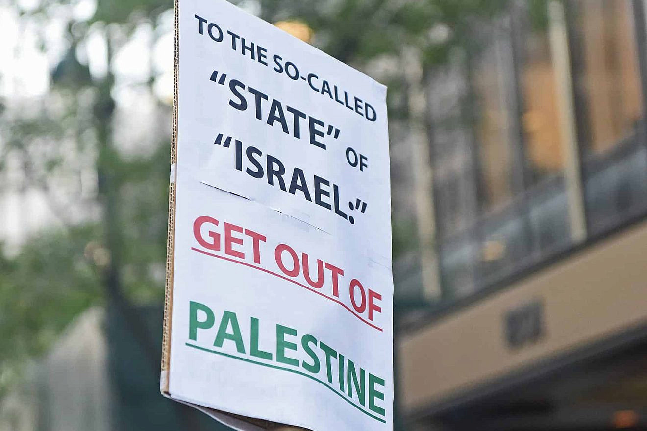 Signs held by Students for Justice in Palestine and other anti-Israel organizations during a prior “Day of Rage.” Credit: A Katz/Shutterstock.
