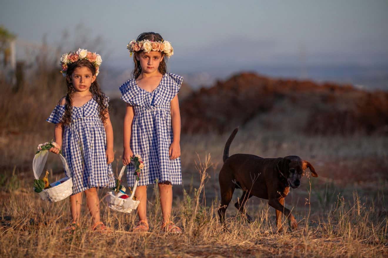 Israeli girls get ready for the Shavuot holiday in Moshav Yashresh in central Israel, May 15, 2021. Photo by Yossi Aloni/Flash90.