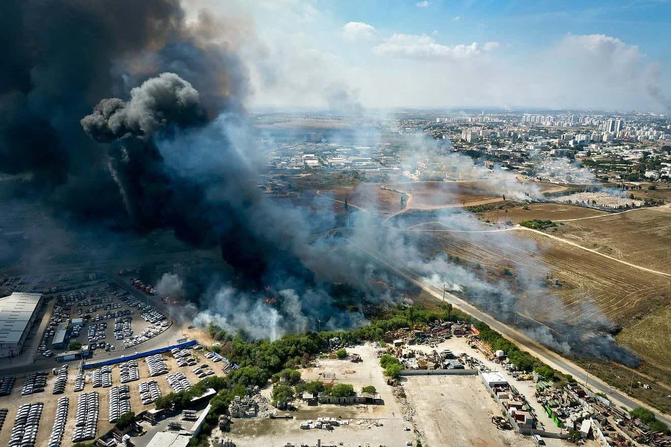 A rocket fired from the Gaza Strip hit and damaged the southern Israeli city of Ashkelon as part of a multi-pronged attack Oct. 7, 2023. Photo by Erik Marmor/Flash90.