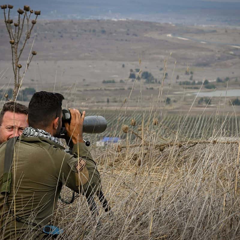 Israeli soldiers watch the Syrian side of the border in the Golan Heights in northern Israel on Oct. 30, 2023. Photo by Michael GiladiFlash90.