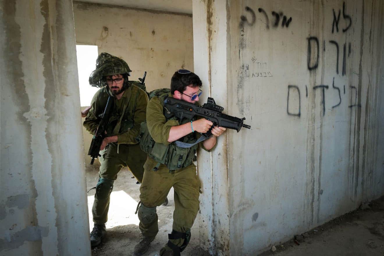 Israeli reserve soldiers train on urban warfare near Kibbutz Merom Golan in the northern Golan Heights ahead of a probable ground incursion into the Gaza Strip, Oct. 9, 2023. Photo by Michael Giladi/Flash90.