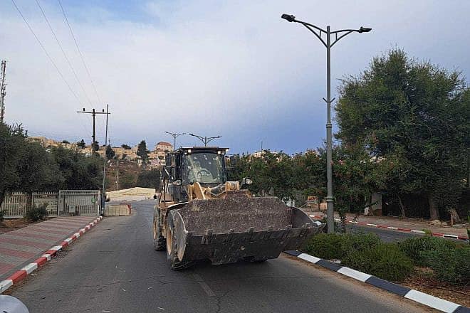 Israeli security forces neutralize a Palestinian terrorist attempting a ramming attack behind the wheel of a tractor in Hebron, Cot. 9, 2023. Credit: TPS.