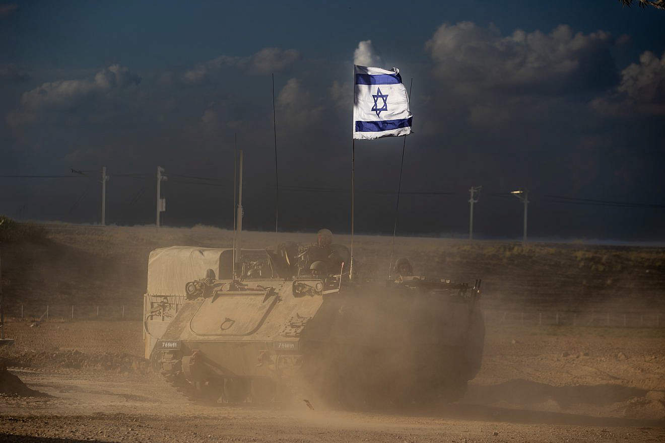 A convoy of military vehicles seen near the Israeli border with the Gaza Strip on Oct. 15, 2023. Photo by Oren Ben Hakoon/Flash90..
