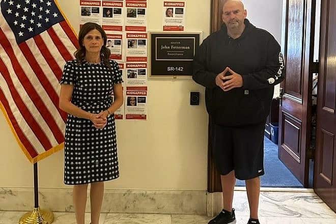 Michal Cotler-Wunsh and Sen. John Fetterman (D-Pa.) at his offices, where he has hung posters of those kidnapped by Hamas and being held captive in the Gaza Strip, on Oct. 26, 2023. Source: X.
