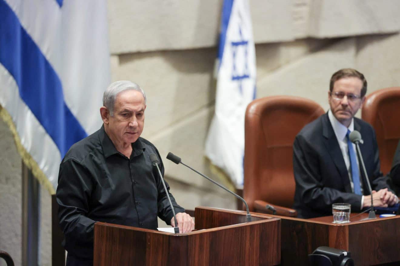 Prime Minister Benjamin Netanyahu and President Isaac Herzog attend a plenary session at the Knesset in Jerusalem, Oct. 16, 2023. Photo by Noam Revkin Fenton/Flash90.