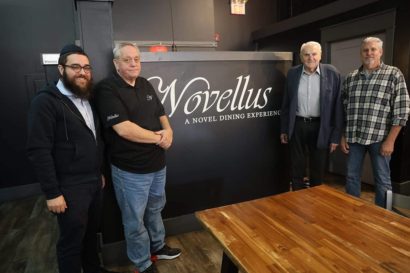 In the Novellus restaurant dining room are (from left): Rabbi Chaim Landa, Joe Ancmon, Bob Affholder and Brett Affholder, October 2023. Photo by Bill Motchan.