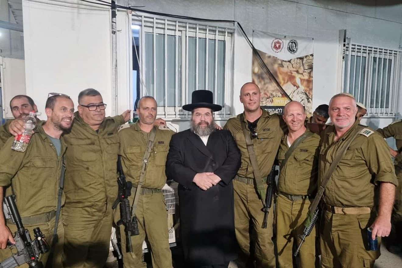 Rabbi David Katz with soldiers in the Israel Defense Forces. Credit: Courtesy.