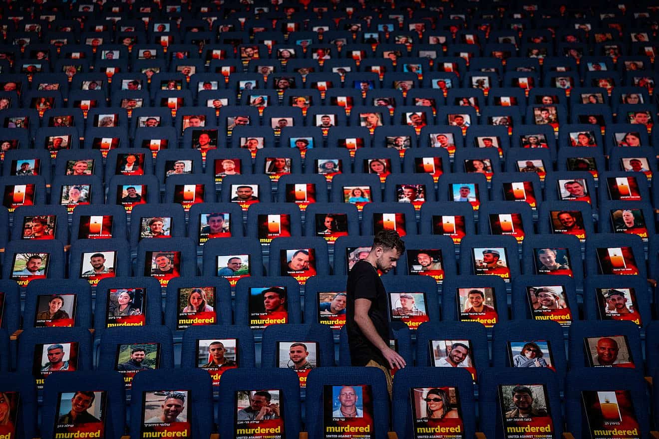 Photos of more than 1,000 people abducted, missing and/or killed in the Hamas terrorist attacks on Oct. 7 in southern Israel are being displayed in the Smolarz Auditorium at Tel Aviv University, Oct. 22, 2023. Photo by Yonatan Sindel/Flash90.