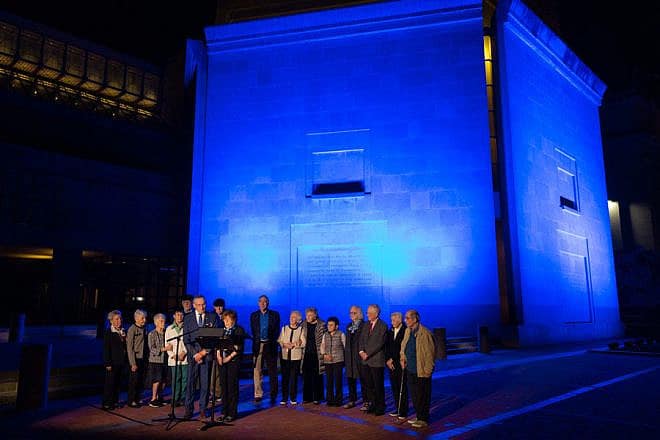 The exterior of the United States Holocaust Memorial Museum is illuminated with blue lights to show solidarity with Israel in light of the murderous terror attacks perpetrated by Hamas, Oct. 11, 2023. Credit: Courtesy.