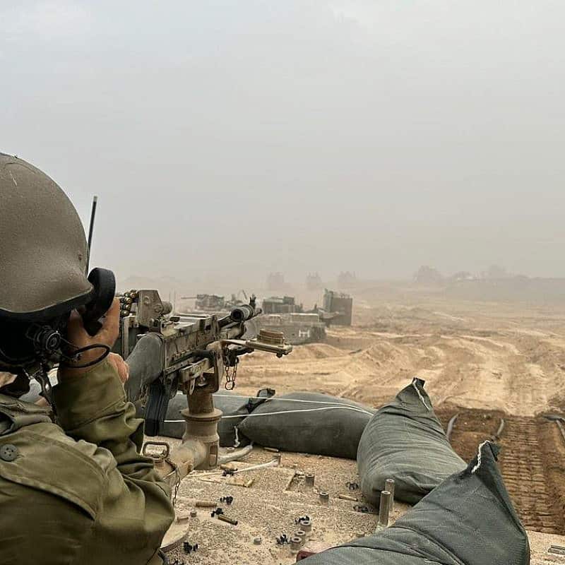 An Israeli soldier on a tank during expanded ground activities in the Gaza Strip. Credit: IDF.