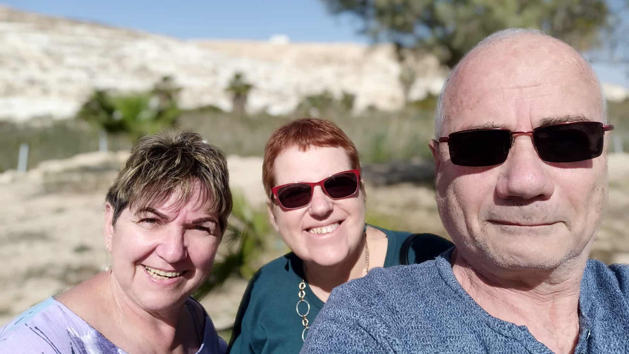 Vivian Roitman (center) with her neighbors, Louis and Carla, who along with three other members of their family were kidnapped by Hamas terrorists and taken to the Gaza Strip on Oct. 7, 2023. Credit: Courtesy.