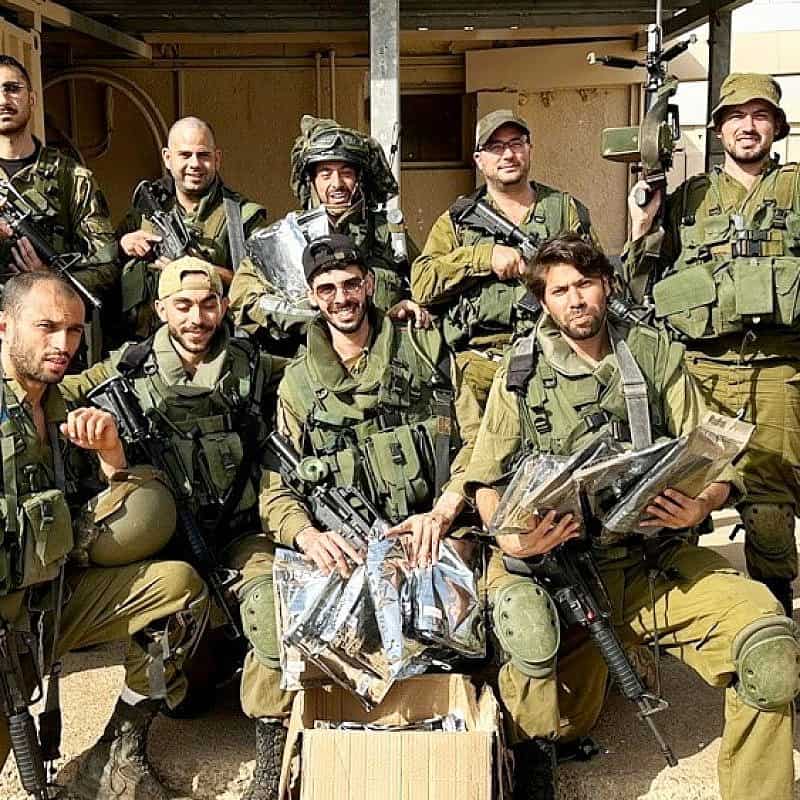 IDF soldiers receive protective equipment from One People, a civilian group that formed shortly after Hamas's Oct. 7 attack on Israel. Photo courtesy of One People.
