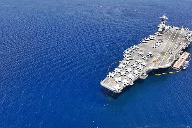 Aerial drone photo of the “USS Gerald R. Ford” aircraft carrier. Credit: Aerial-motion/Shutterstock.