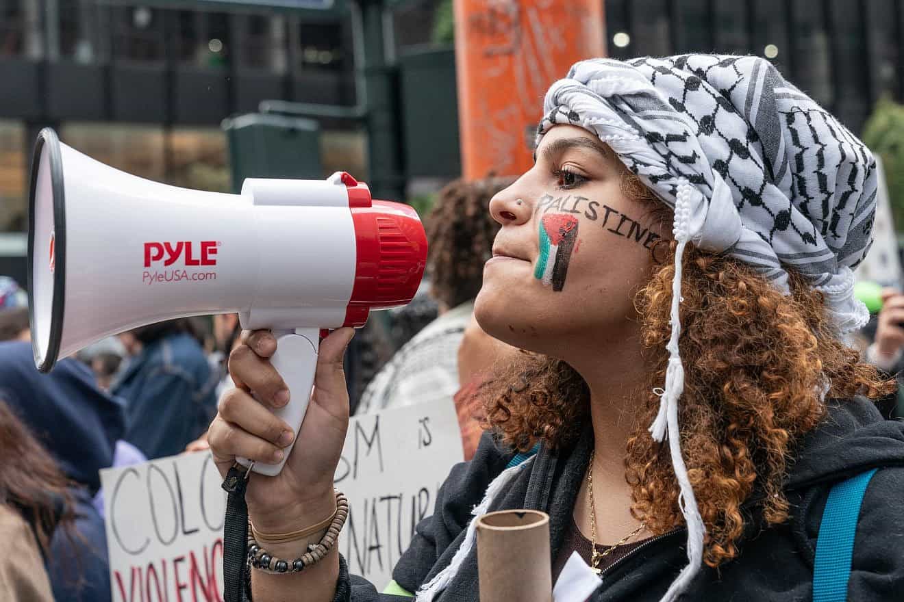 A supporter of the Oct. 7, 2023 Hamas attack on Israel at a rally in New York City on Oct. 9, 2023. Credit: Lev Radin/Shutterstock