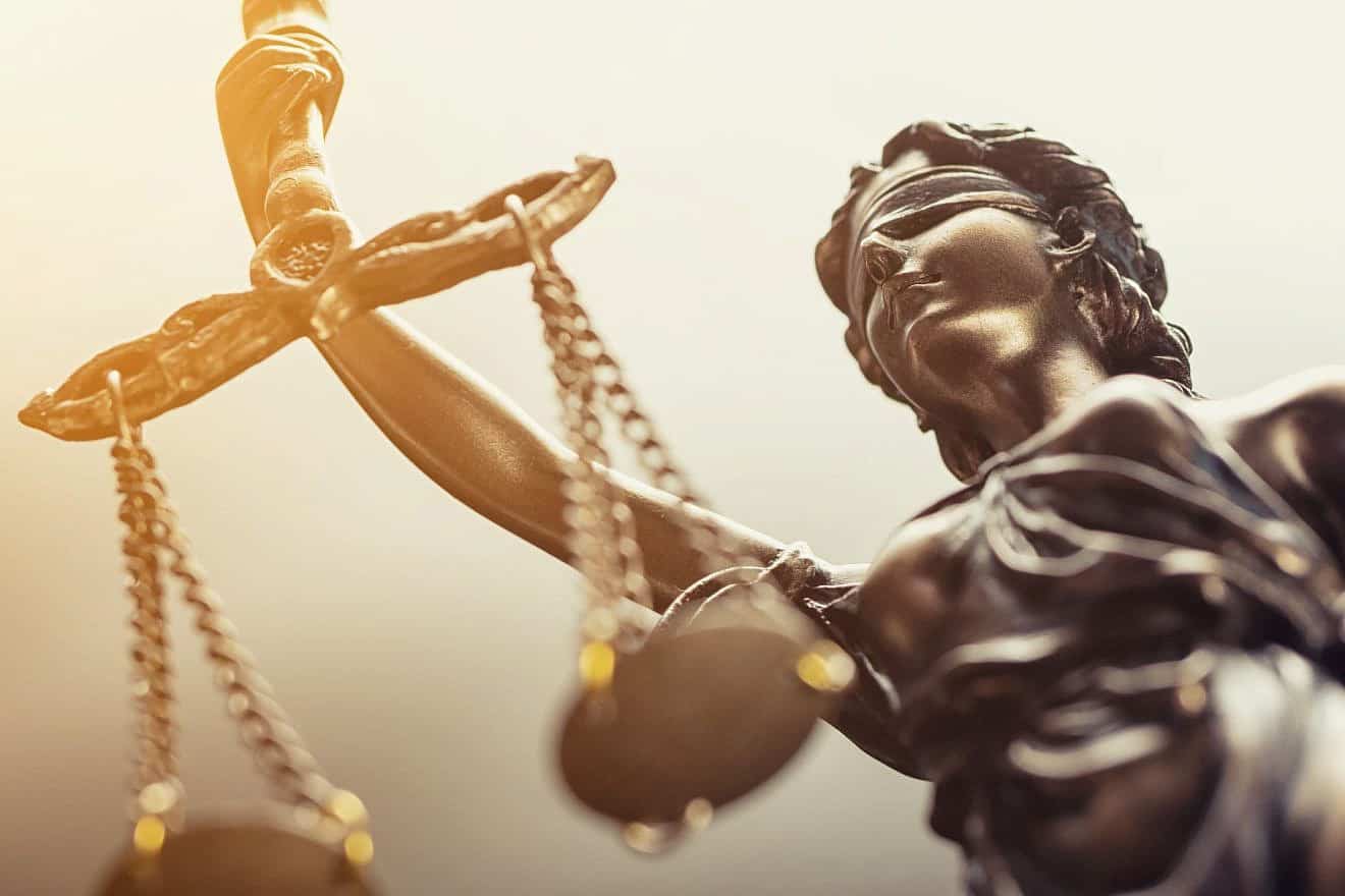 A symbolic statue of justice. Credit: r.classen/Shutterstock