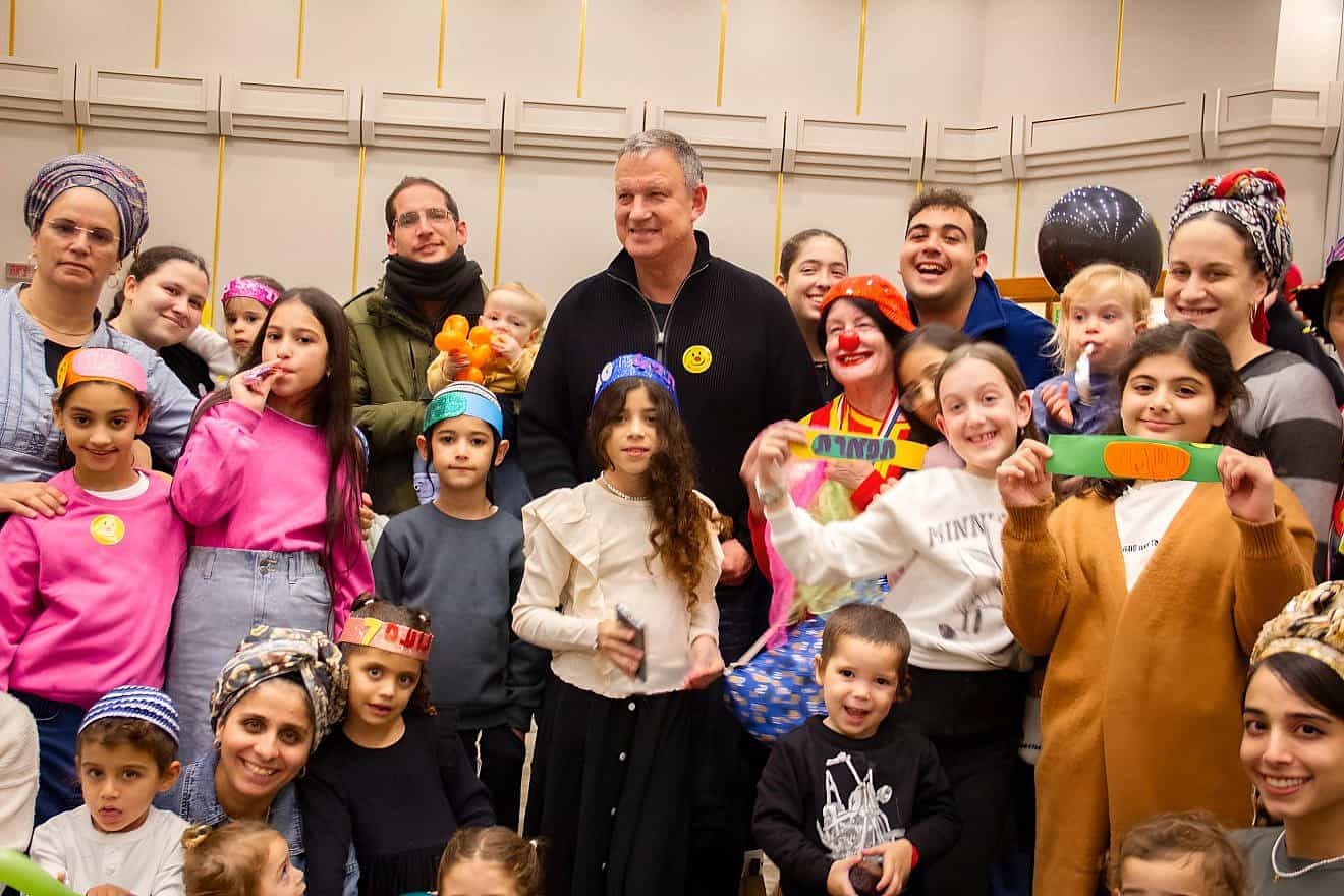 The nonprofit organization Bakehila, founded by Israeli entrepreneur Eran Margalit (center), has held more than 100 birthday parties for displaced kids from across Israel since the terrorist attacks of Oct. 7, 2023. Photo by Yoav Ronen.