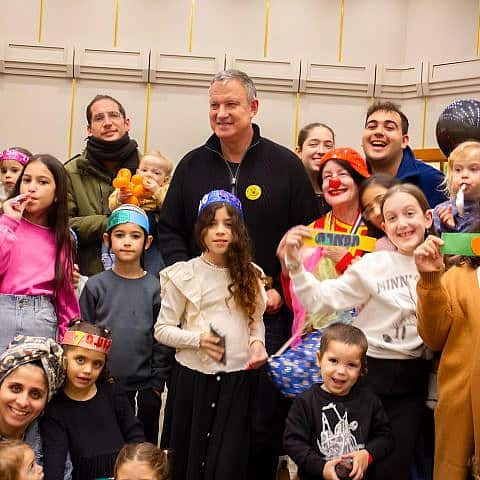 The nonprofit organization Bakehila, founded by Israeli entrepreneur Eran Margalit (center), has held more than 100 birthday parties for displaced kids from across Israel since the terrorist attacks of Oct. 7, 2023. Photo by Yoav Ronen.
