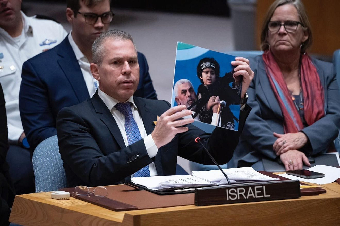 Gilad Erdan, Israeli ambassador to the United Nations, shows a photo Yahya Sinwar, Hamas’s chief in the Gaza Strip, holding a young child with an automatic weapon at a U.N. Security Council meeting on Nov. 22, 2023. Credit: Courtesy of Israeli Mission to the U.N.