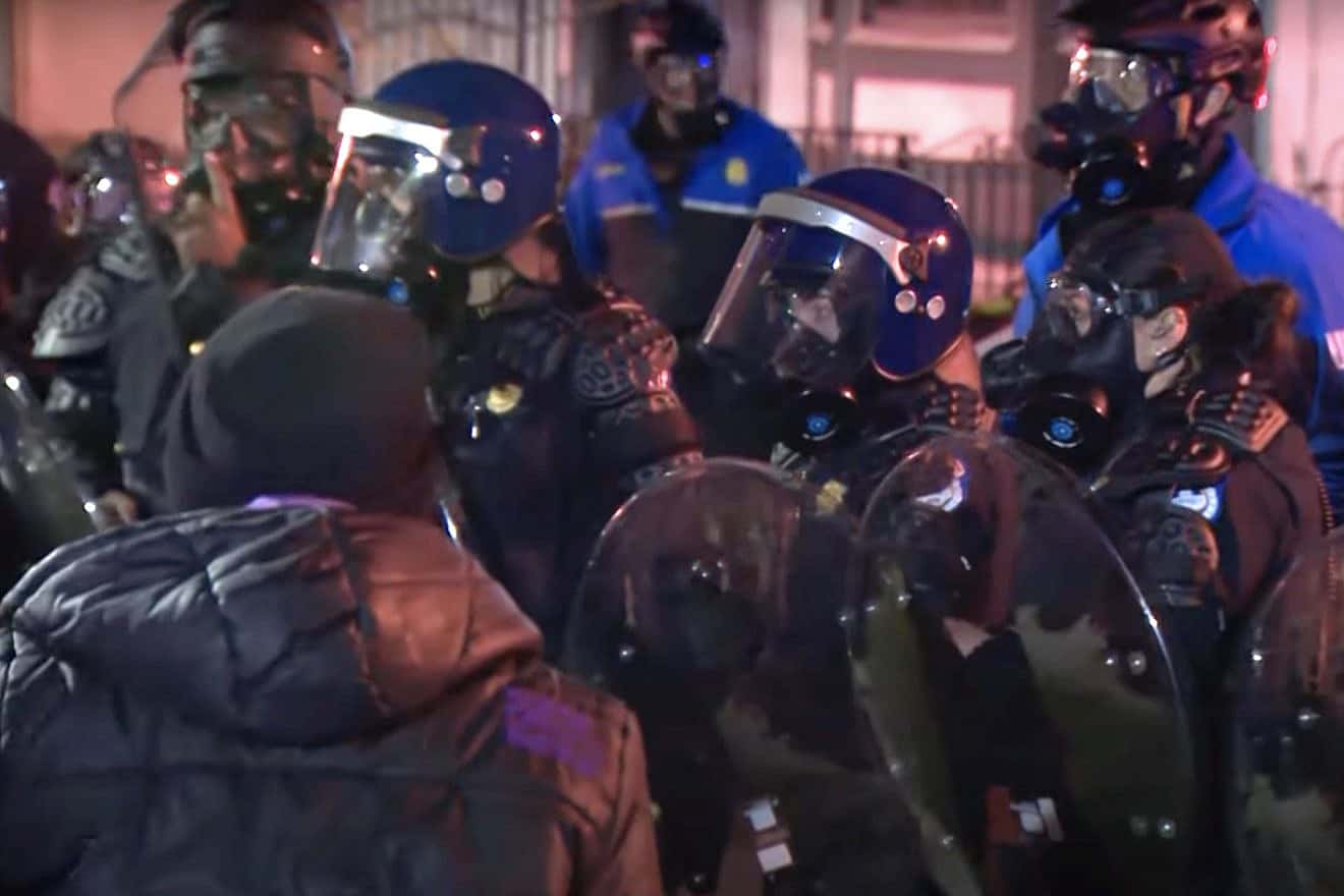 Protesters demanding a ceasefire clashed with police outside the Democratic National Committee’s Washington headquarters on Nov. 15, 2023. Source: YouTube screenshot/WUSA9.