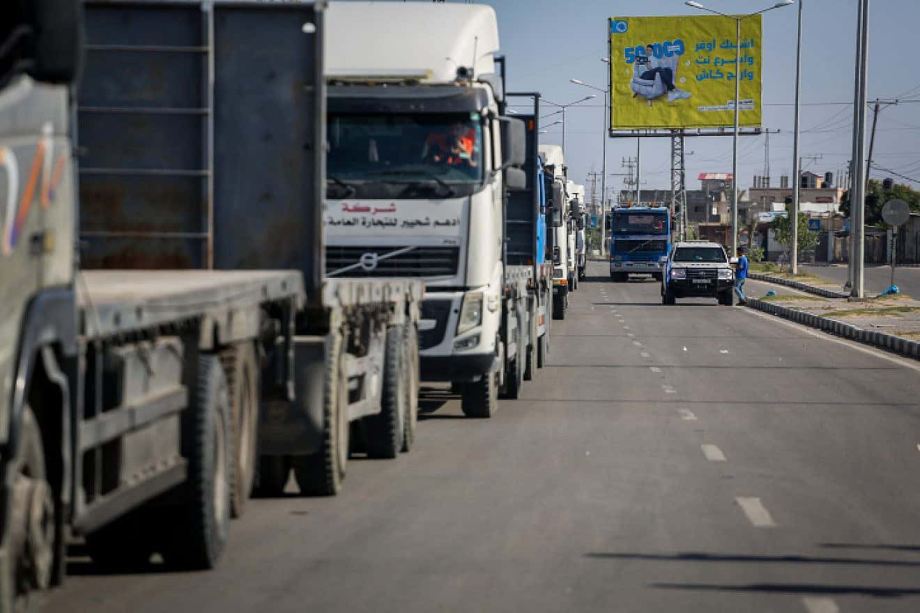 Trucks with humanitarian aid arrive at the Gaza side of the Rafah border crossing with Egypt, Oct. 21, 2023. Photo by Atia Mohammed/Flash90.