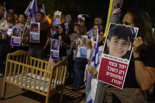 Israelis attend a rally calling for the release of the 240 hostages held kidnapped by Hamas terrorists in Gaza outside the home of Israeli minister of Justice Yariv Levin, in Modi'in, Nov. 9, 2023. Photo by Jonathan Shaul/Flash90.