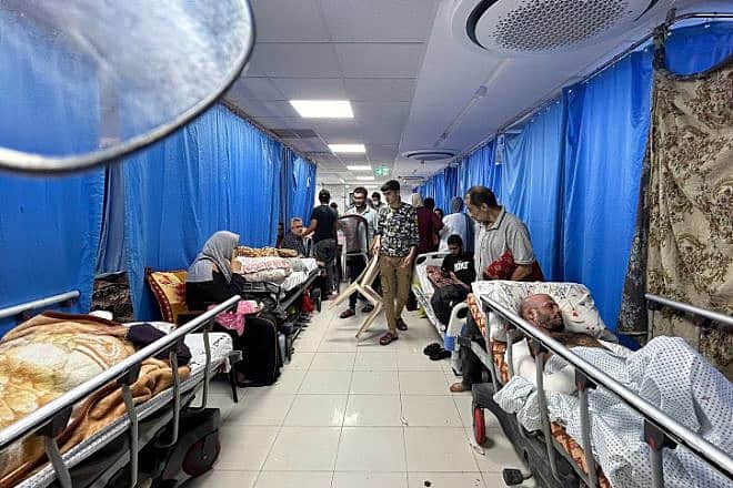 Palestinian patients line the halls in Shifa Hospital in the Gaza Strip on on Nov. 10, 2023. Photo by Flash90.