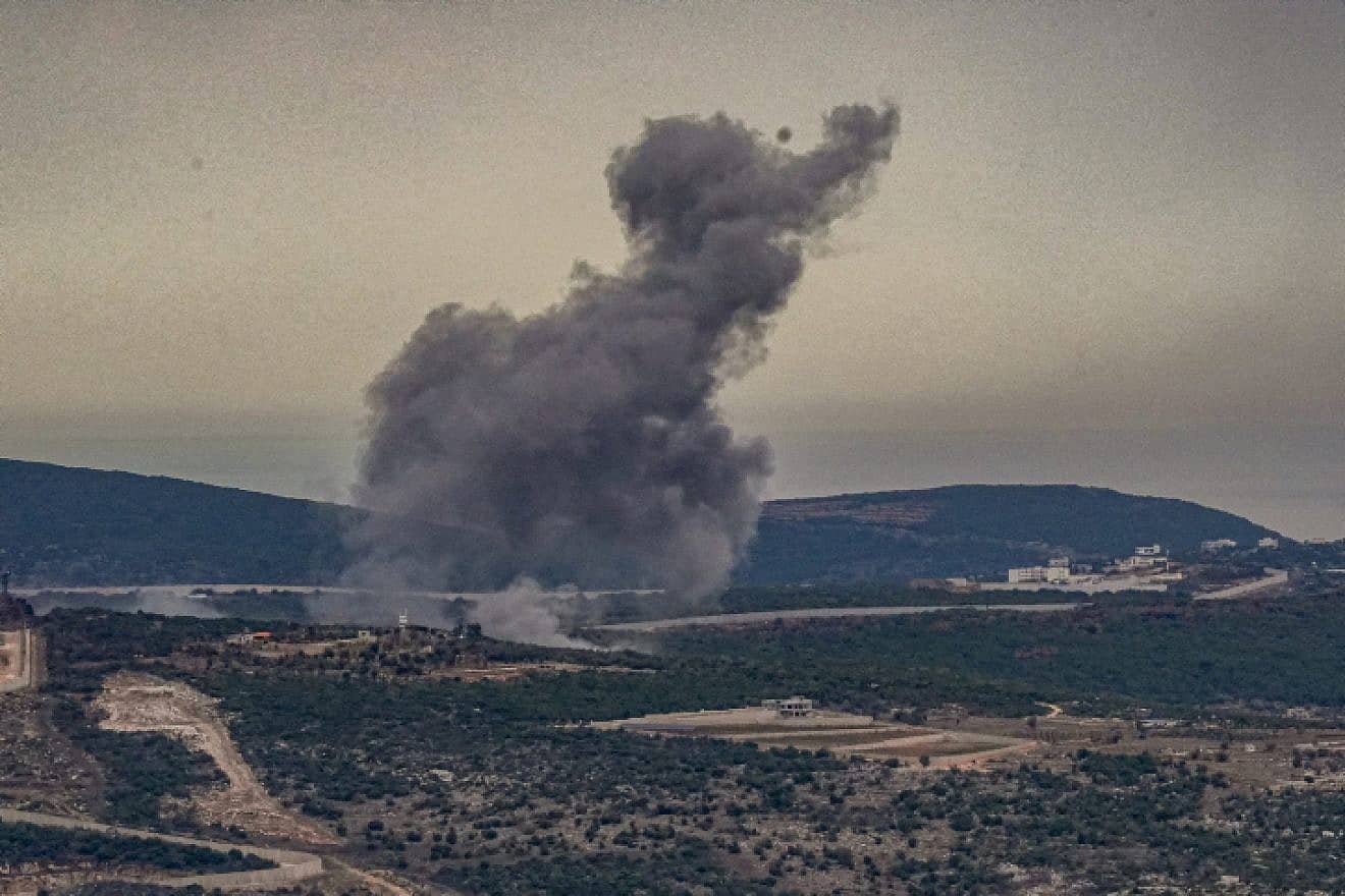 Smoke and flares during an exchange of fire between the Israel Defense Forces and Hezbollah terrorists on the border between Israel and Lebanon, Nov. 12, 2023. Photo by Ayal Margolin/Flash90.