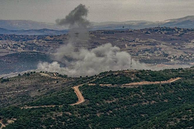 Smoke rises following an exchange of fire between the Israel Defense Forces and Hezbollah terrorists, Nov. 12, 2023. Photo by Ayal Margolin/Flash90.