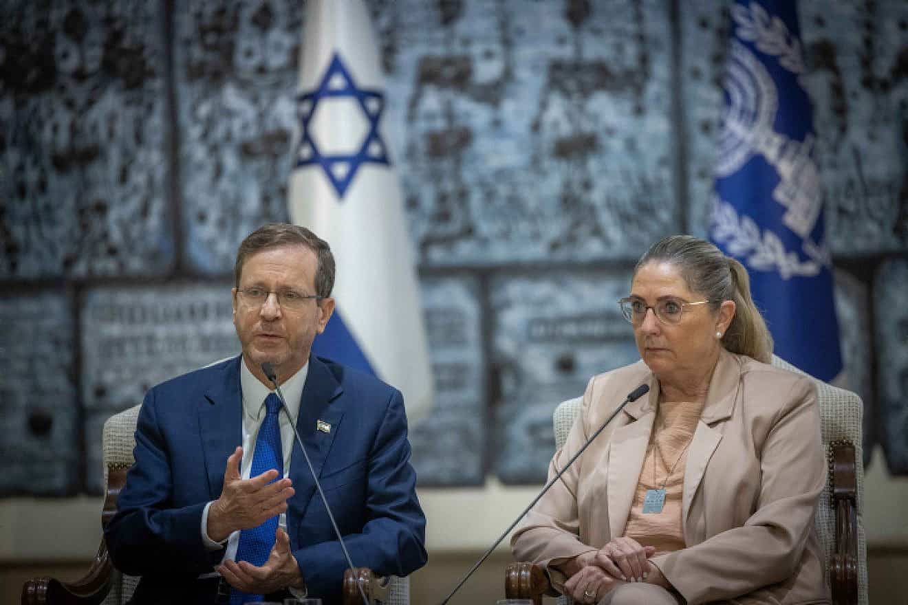 Israeli President Isaac Herzog and his wife, Michal, meet residents of Kibbutz Be'eri at the President's Residence in Jerusalem, Nov. 12, 2023. Photo by Yonatan Sindel/Flash90.