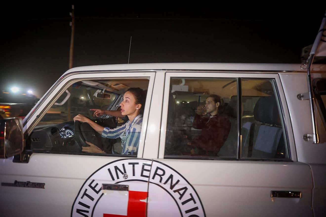 Russian-Israeli Roni Krivoi sits in a Red Cross vehicle after he was released from Hamas captivity at the Rafah crossing, Gaza Strip, Nov. 26, 2023. Photo by Atia Mohammed/Flash90.