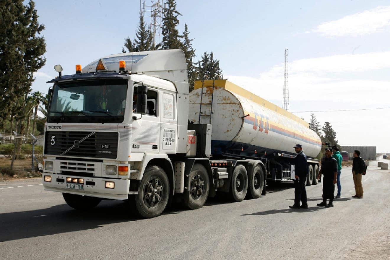 A Palestinian truck carrying fuel is seen after entering Rafah in the southern Gaza Strip, Dec. 5, 2013. Photo by Abed Rahim Khatib/Flash90.