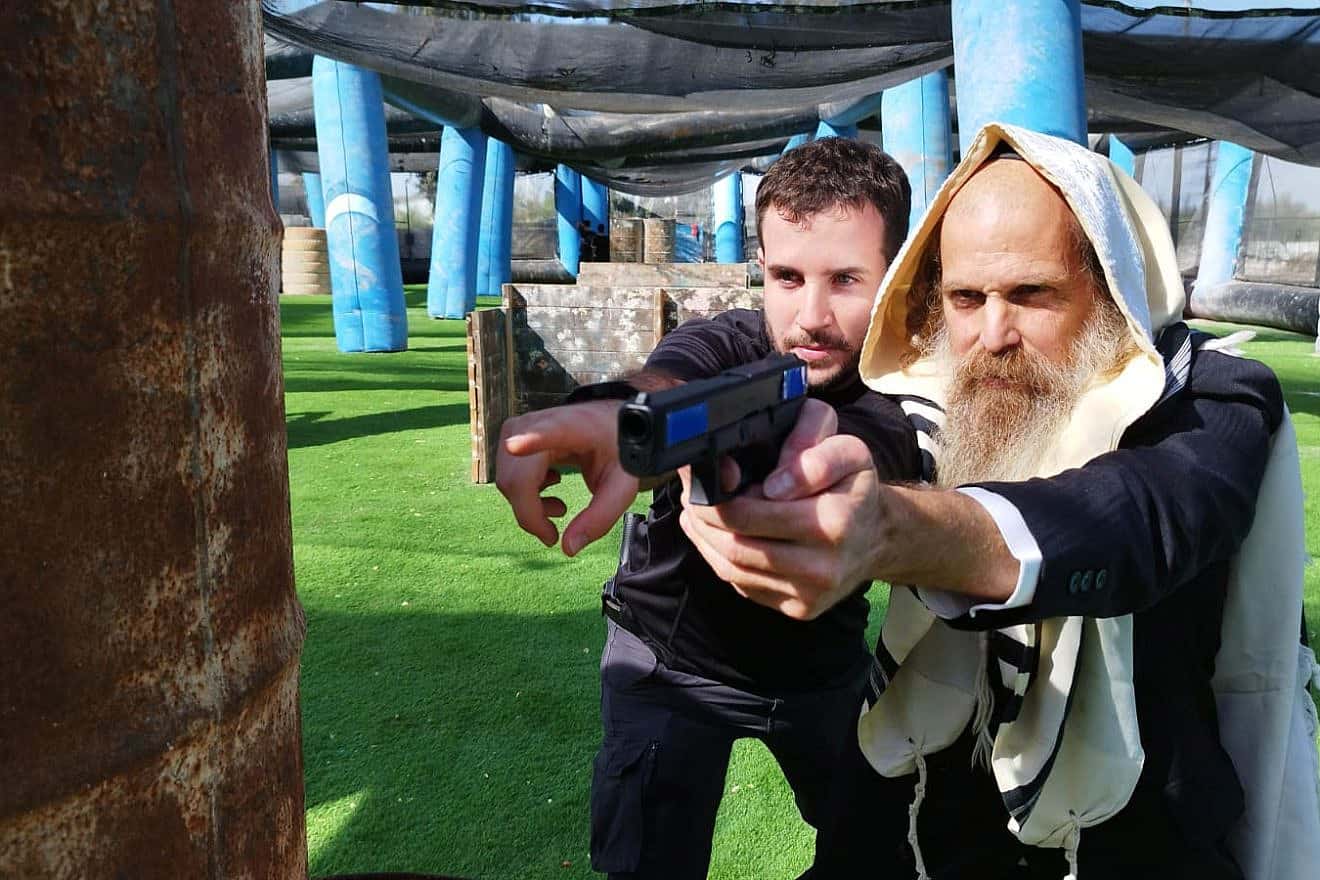 An ultra-Orthodox, or Haredi Jew, trains to use a pistol. Credit: Mishmer.